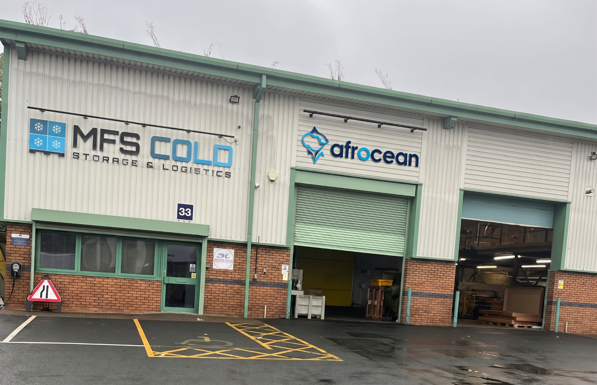 Afrocean warehouse signage and open loading bays in Walsall